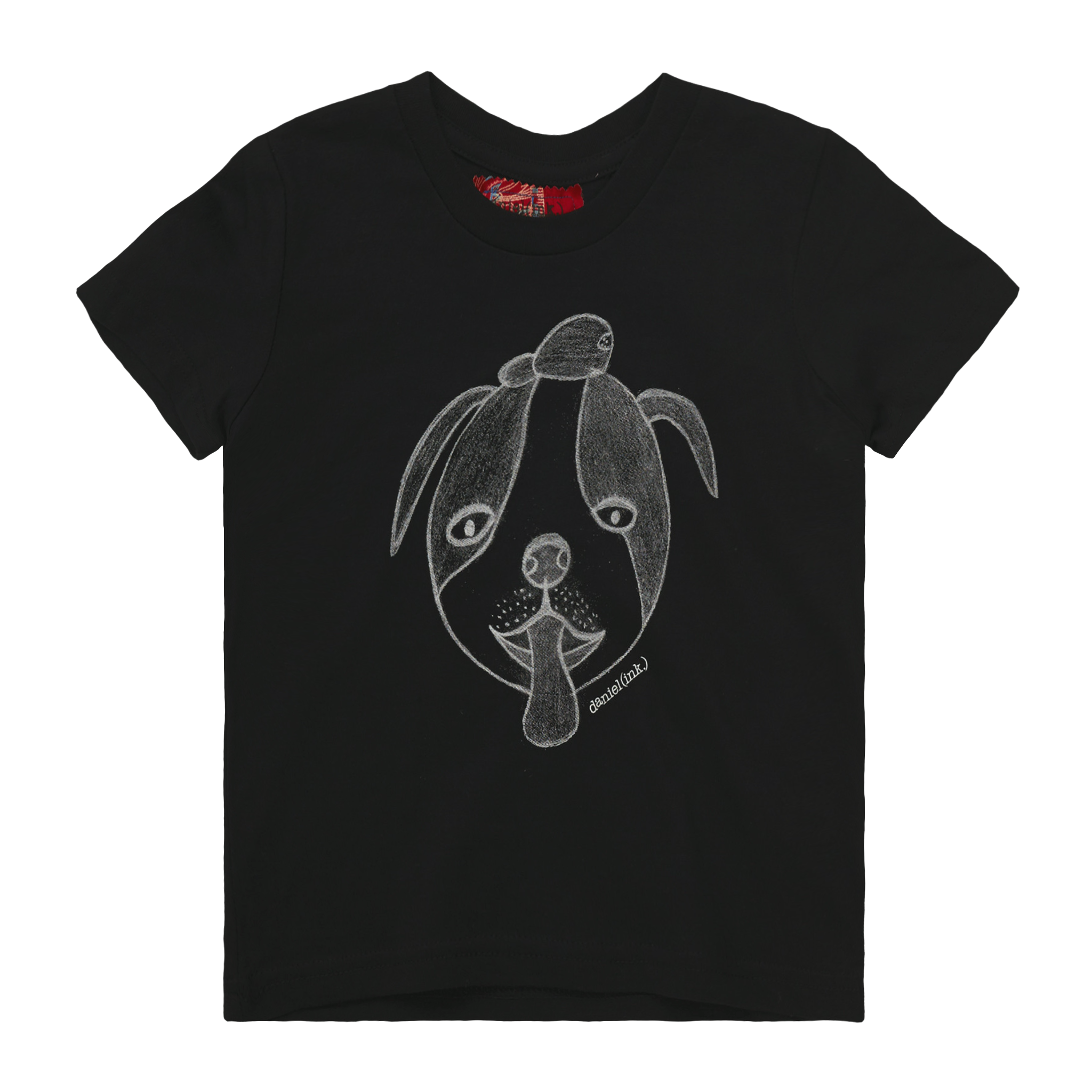 Black kids' t-shirt featuring a hand drawn sketch of a dog’s face in white. The dog has a round head, floppy ears, wide eyes, and its tongue is sticking out. The t-shirt has a red fabric label on the back of the neck.