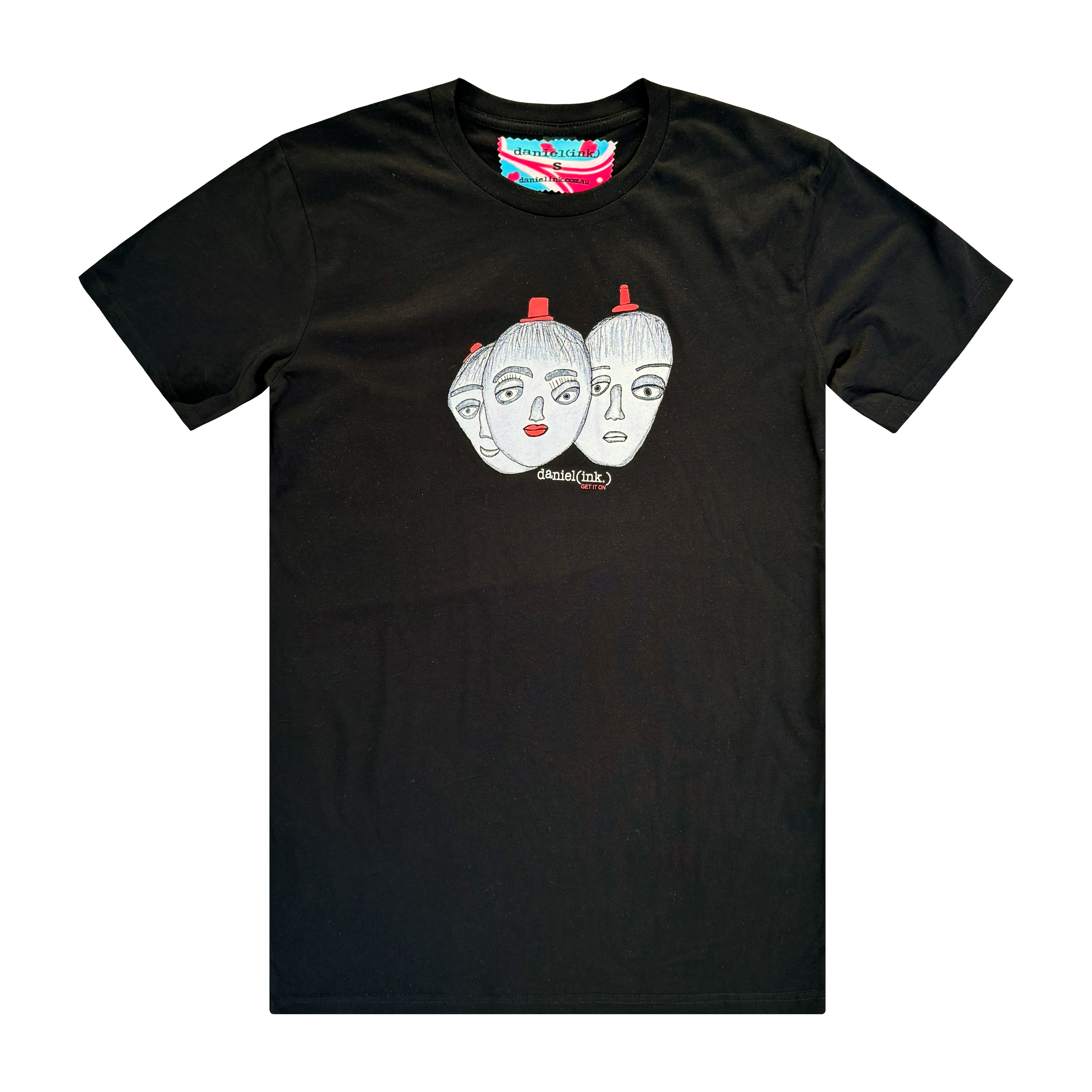 Men's black t-shirt featuring a hand drawn sketch of three faces merged together. The three faces have red hats and the face in the middle has red lips. This t-shirt has a red, white, and blue fabric label on the back of the neck.