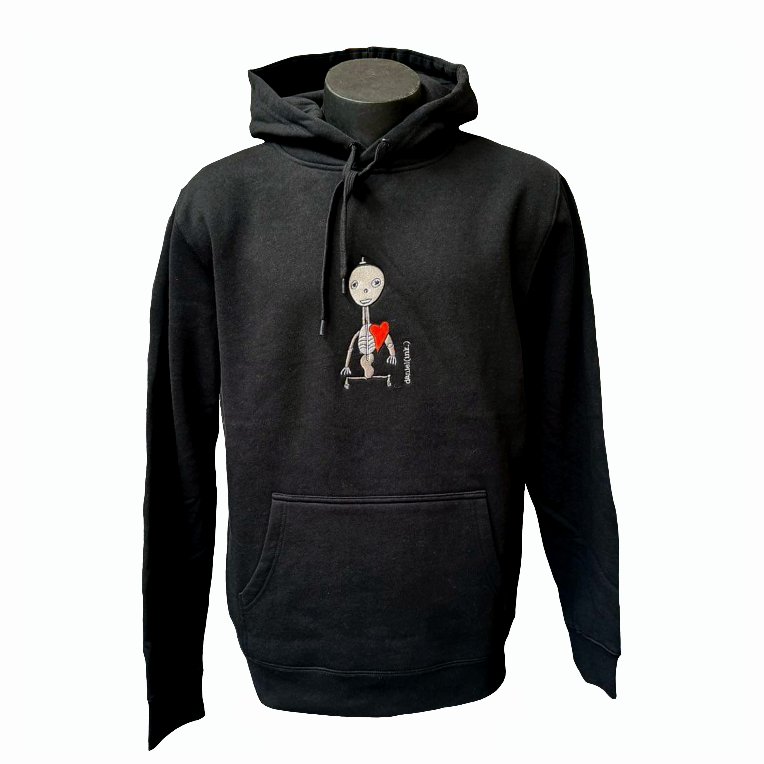 Unisex black hoodie featuring an embroidered image of a silver skeleton with a red heart. The name daniel(ink.) is embroidered in silver thread next to the skeleton.