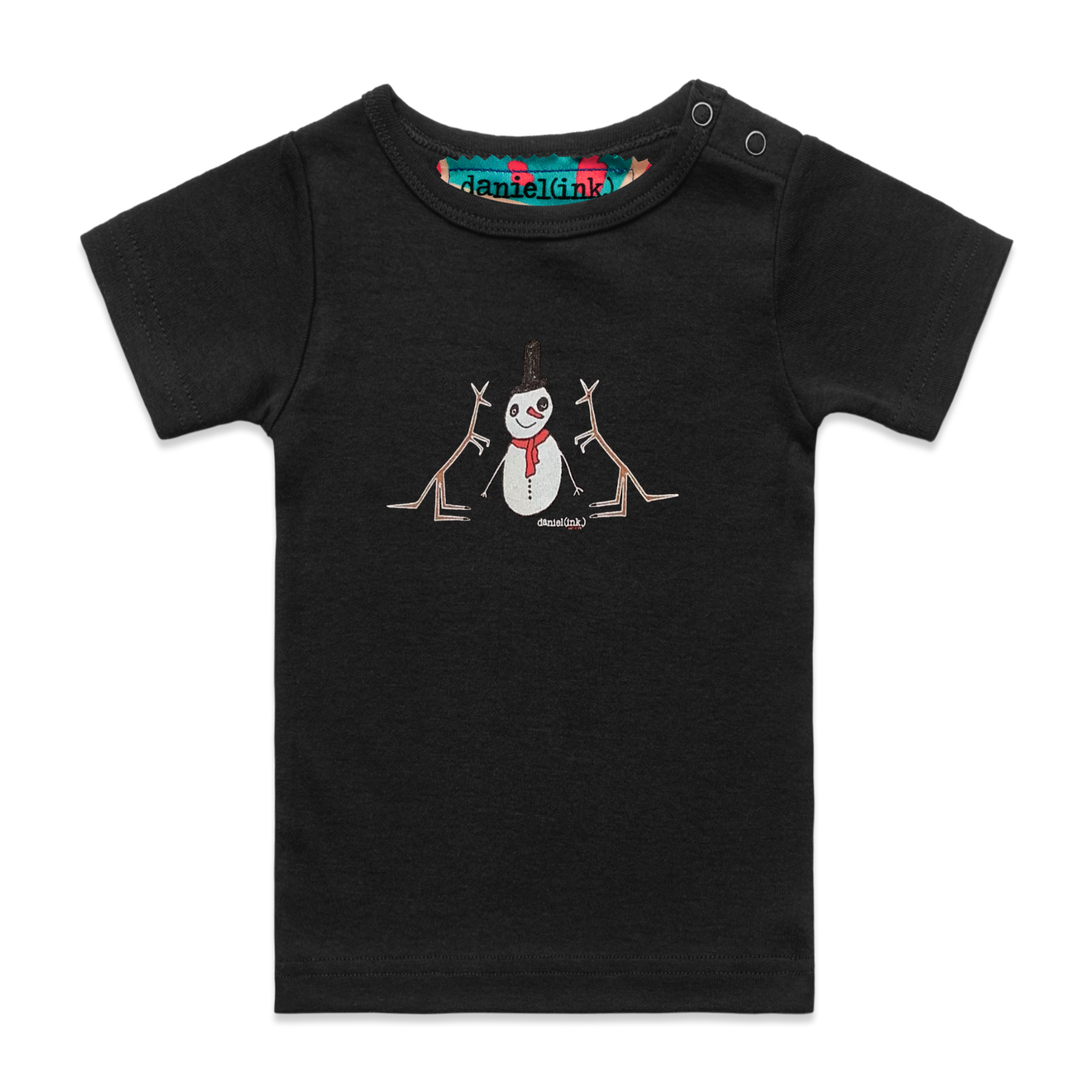 Black short sleeve babies' t-shirt featuring an image of a snowman with two kangaroos. The snowman is wearing an orange scarf and a black top hat with one brown kangaroo either side of him. The t-shirt has a red, white, and blue fabric label on the back of the neck and has two black press studs on the left shoulder. 