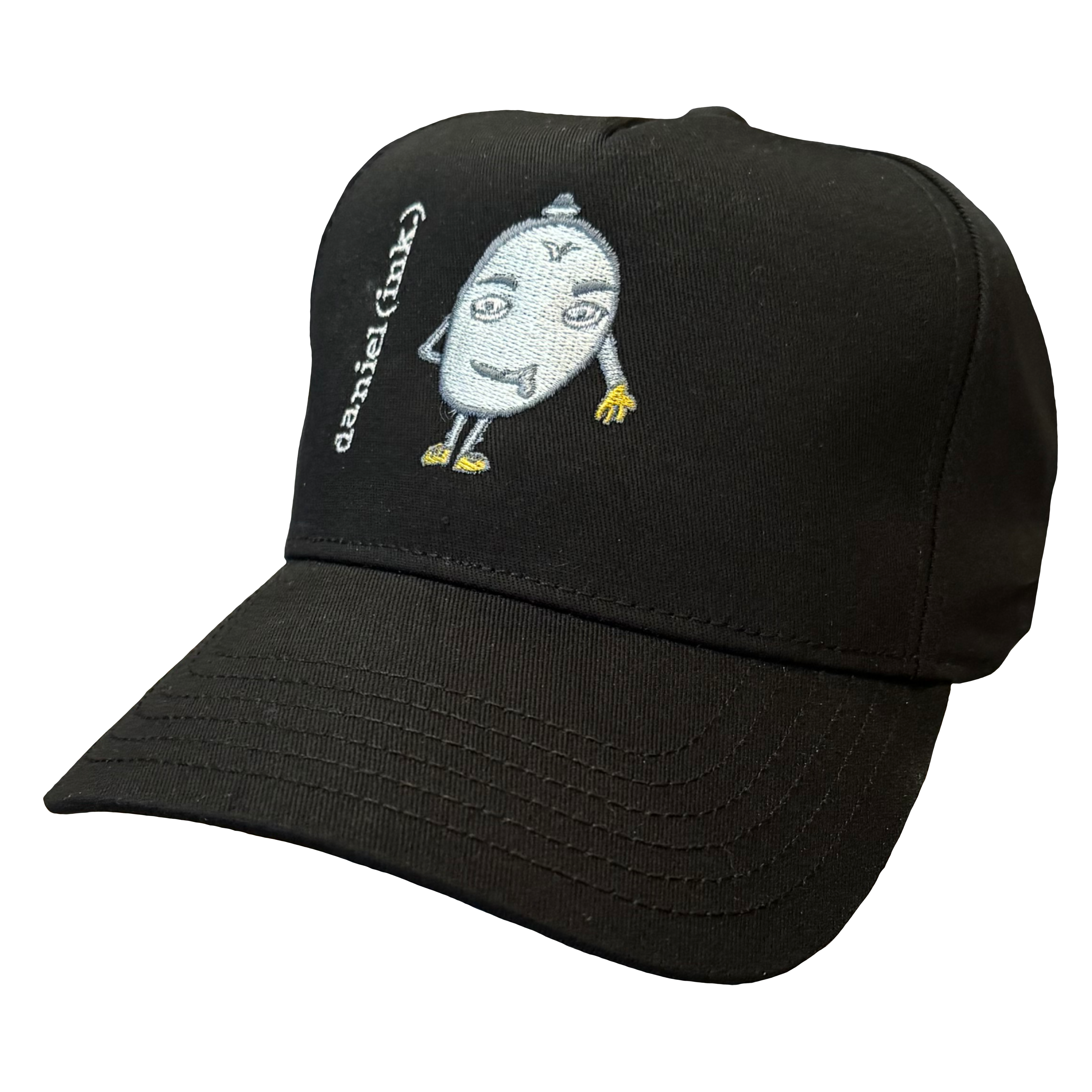 Black snapback cap featuring an embroidered image of a humanoid egg man in silver. The egg man is wearing a silver bowler hat, gold gloves, and gold shoes, and is sticking his tongue out. The name daniel(ink.) is embroidered in silver thread next to the egg man's face. 