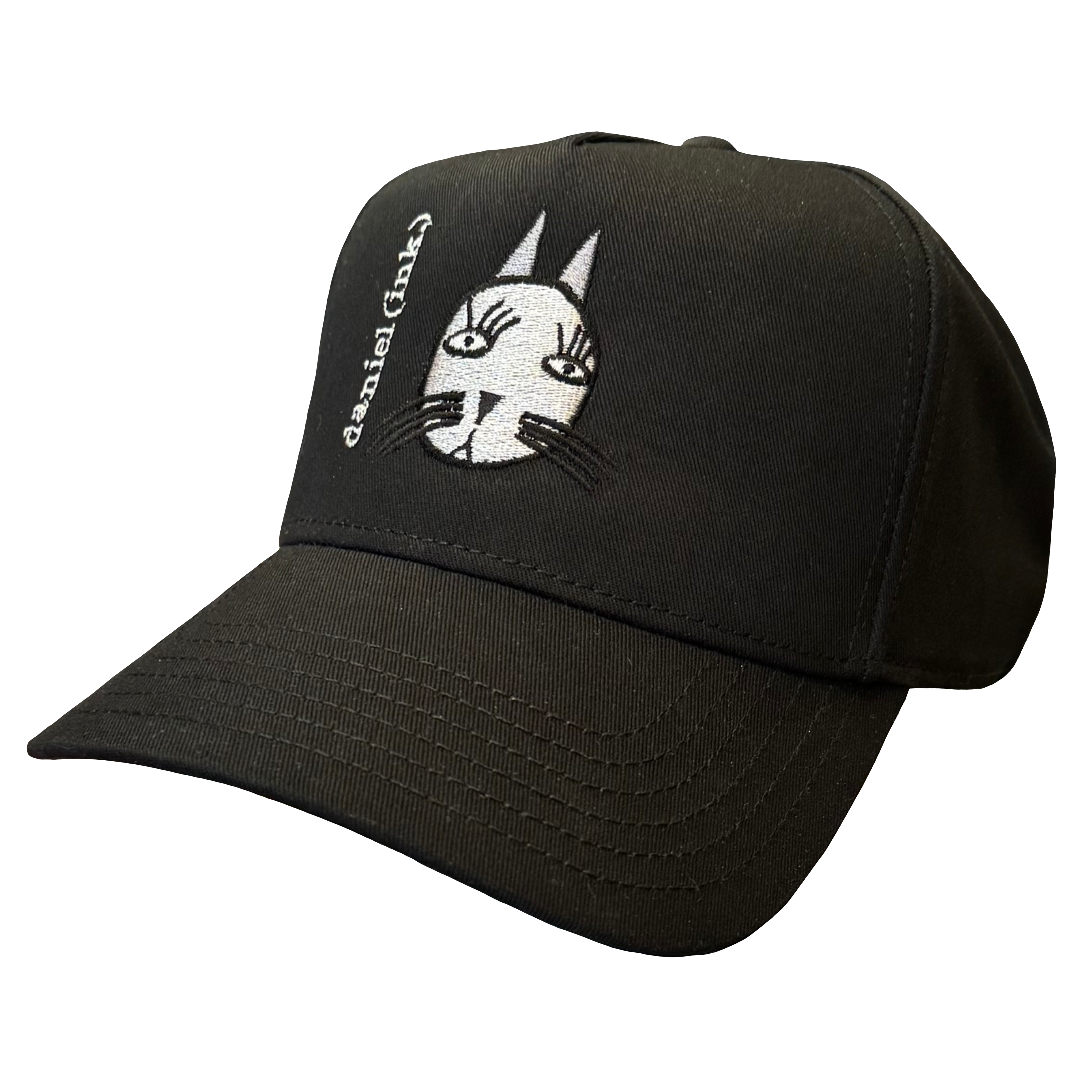 Black snapback cap featuring an embroidered image of a cat's head in silver. The cat has long pointy ears, long eyelashes, and long whiskers coloured black. The name daniel(ink.) is embroidered in silver thread next to the cat's head. 